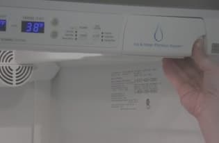 how to change water filter in frigidaire professional refrigerator